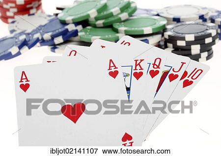 Poker, playing cards, gaming chips, tokens, with different values, the highest card combination, Royal Flush View Large Photo Image Stock Photo - Poker, playing cards, gaming chips, tokens, with different values, the highest card combination, Royal Flush. Fotosearch