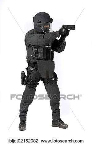 Police, Special Task Force, SEK, officer wearing full protective uniform holding a Sig Sauer P6 P225 pistol View Large Photo Image Stock Image - Police, Special Task Force, SEK, officer wearing full protective uniform holding a Sig Sauer P6 P225 pistol. Fotosearch