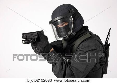 Police, Special Task Force, SEK, officer wearing full protective uniform holding a Sig Sauer P6 P225 pistol View Large Photo Image Stock Image - Police, Special Task Force, SEK, officer wearing full protective uniform holding a Sig Sauer P6 P225 pistol. Fotosearch