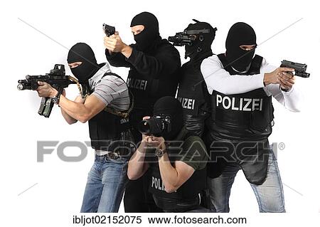 Police, Specialist Mobile Task Force, MEK, equipped with night vision goggles, machine guns, MP5, Sig P6 pistols and cameras View Large Photo Image Stock Photography - Police, Specialist Mobile Task Force, MEK, equipped with night vision goggles, machine guns, MP5, Sig P6 pistols and cameras. Fotosearch