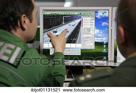 Policemen analysing police video footage controlling the distance between vehicles, North Rhine-Westphalia, Germany, Europe View Large Photo Image Stock Image - Policemen analysing police video footage controlling the distance between vehicles, North Rhine-Westphalia, Germany, Europe. Fotosearch