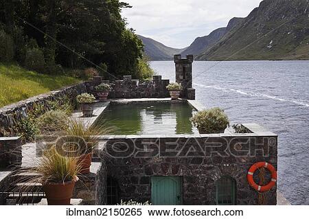 Pool and boathouse on Lough Veagh, Glenveagh Castle and Gardens, Glenveagh National Park, County Donegal, Ireland, Europe View Large Photo Image Stock Photography - Pool and boathouse on Lough Veagh, Glenveagh Castle and Gardens, Glenveagh National Park, County Donegal, Ireland, Europe. Fotosearch
