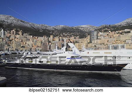 Port Hercule with a motor yacht, The One, in winter, Principality of Monaco, Côte d'Azur, Mediterranean Sea, Europe View Large Photo Image Stock Image - Port Hercule with a motor yacht, The One, in winter, Principality of Monaco, Côte d'Azur, Mediterranean Sea, Europe. Fotosearch