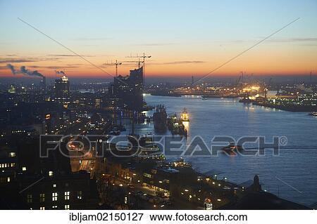 Port of Hamburg with views to the Elbe Philharmonic Hall at sunrise, Hamburg, Germany, Europe View Large Photo Image Stock Photo - Port of Hamburg with views to the Elbe Philharmonic Hall at sunrise, Hamburg, Germany, Europe. Fotosearch