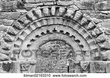 Portal with human masks, church ruins of Dysert O'Dea near Corofin, County Clare, Ireland, Europe View Large Photo Image Stock Image - Portal with human masks, church ruins of Dysert O'Dea near Corofin, County Clare, Ireland, Europe. Fotosearch