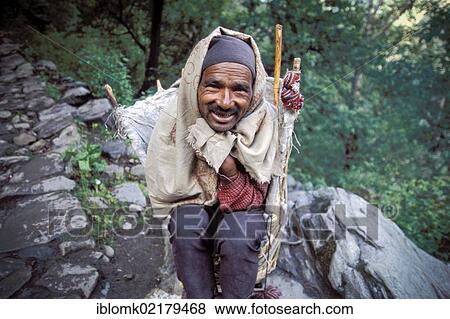 Porter near Hemkund, Uttarakhand, formerly Uttaranchal, Indian Himalayas, North India, India, Asia View Large Photo Image Stock Photo - Porter near Hemkund, Uttarakhand, formerly Uttaranchal, Indian Himalayas, North India, India, Asia. Fotosearch