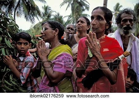 Stock Photo - Praying women, Pooram Festival, Aratthapuzha near Thrissur, Kerala, South India, India, Asia. Fotosearch