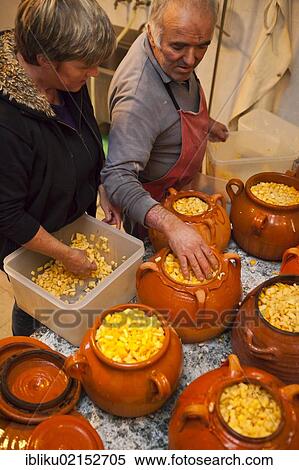 Stock Photography - Preparation of Tofeja, a specialty in the Rifugio Salvin, Lanzo, Piedmont, Italy, Europe. Fotosearch