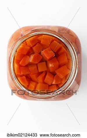Preserved food, open jar of diced carrots View Large Photo Image Stock Image - Preserved food, open jar of diced carrots. Fotosearch