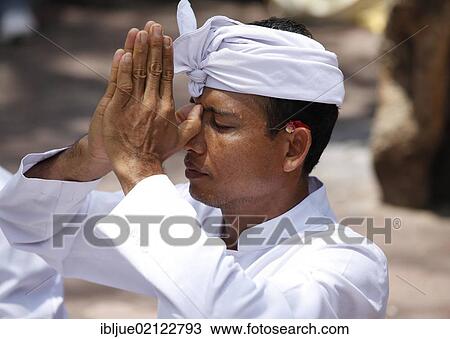 Priest during a Hindu temple ceremony, Nusa Dua, Bali, Indonesia, Southeast Asia, Asia View Large Photo Image Stock Image - Priest during a Hindu temple ceremony, Nusa Dua, Bali, Indonesia, Southeast Asia, Asia. Fotosearch