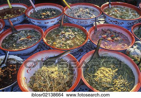 Ready meals at cookshop, Talat Tha Heua Market, Luang Prabang, Laos, Indochina, Asia View Large Photo Image Picture - Ready meals at cookshop, Talat Tha Heua Market, Luang Prabang, Laos, Indochina, Asia. Fotosearch
