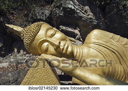 Reclining Buddha statue on Phousi Mountain, Luang Prabang, Laos, Indochina, Asia View Large Photo Image Stock Image - Reclining Buddha statue on Phousi Mountain, Luang Prabang, Laos, Indochina, Asia. Fotosearch