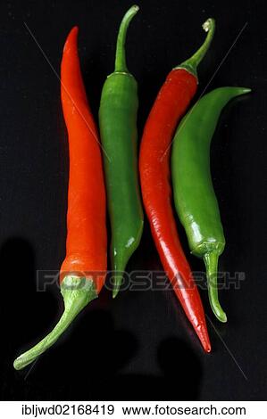 Red and green chilis View Large Photo Image Stock Photo - Red and green chilis. Fotosearch