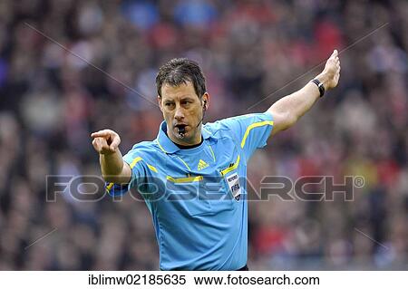 Referee Wolfgang Stark showing foul play, awarding a free kick, Mercedes-Benz Arena, Stuttgart, Baden-Wuerttemberg, Germany, Europe View Large Photo Image Stock Photography - Referee Wolfgang Stark showing foul play, awarding a free kick, Mercedes-Benz Arena, Stuttgart, Baden-Wuerttemberg, Germany, Europe. Fotosearch