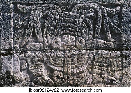 Stock Image - Relief on a stone pillar, Court of the Thousand Columns, Mayan ruins of Chichen Itza, Yucatan, Mexico, North America. Fotosearch