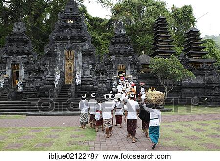 Stock Photo - Religious ceremony at a temple in front of the bat cave, Goa Lawah, Bali, Indonesia, Southeast Asia, Asia. Fotosearch