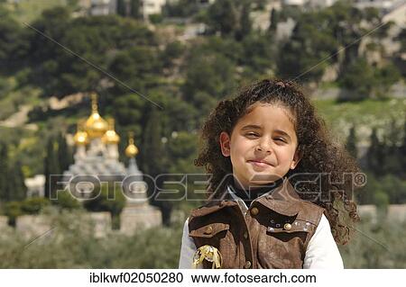 Religious diversity, Israeli-Palestinian girl on the Temple Mount, Russian Orthodox Church of Mary Magdalene on the Mount of Olives at back, Muslim Quarter, Old City, Jerusalem, Middle East View Large Photo Image Stock Image - Religious diversity, Israeli-Palestinian girl on the Temple Mount, Russian Orthodox Church of Mary Magdalene on the Mount of Olives at back, Muslim Quarter, Old City, Jerusalem, Middle East. Fotosearch