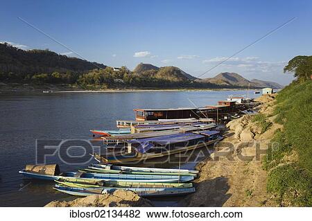 River boats on the Mekong River, Luang Prabang, Laos, Indochina, Asia View Large Photo Image Stock Image - River boats on the Mekong River, Luang Prabang, Laos, Indochina, Asia. Fotosearch