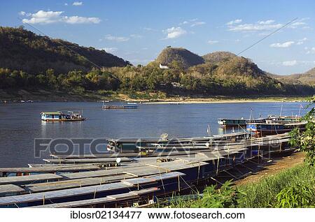River boats on the Mekong River, Luang Prabang, Laos, Indochina, Asia View Large Photo Image Stock Photo - River boats on the Mekong River, Luang Prabang, Laos, Indochina, Asia. Fotosearch