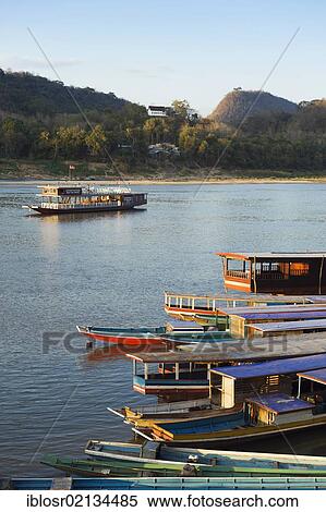 River boats on the Mekong River, Luang Prabang, Laos, Indochina, Asia View Large Photo Image Stock Photography - River boats on the Mekong River, Luang Prabang, Laos, Indochina, Asia. Fotosearch