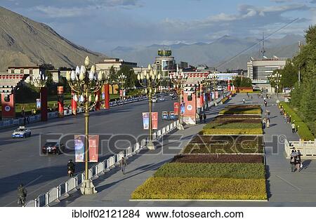 Road from the Potala Palace, winter palace of the Dalai Llama, towards the remaining Tibetan town and post office in Lhasa, Tibet, China, Asia View Large Photo Image Picture - Road from the Potala Palace, winter palace of the Dalai Llama, towards the remaining Tibetan town and post office in Lhasa, Tibet, China, Asia. Fotosearch