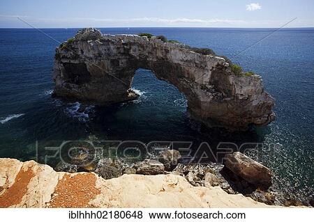 Stock Photo - Rock arch, Cala Santanyi, southeast coast, Majorca, Balearic Islands, Spain, Europe. Fotosearch