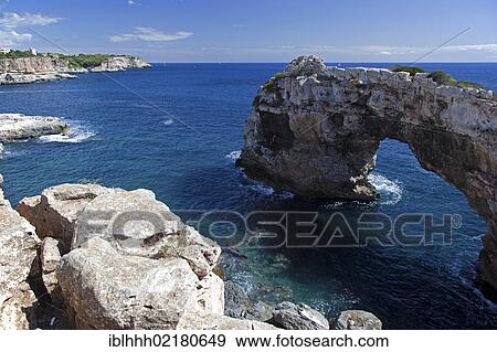 Stock Photo - Rock arch, Cala Santanyi, southeast coast, Majorca, Balearic Islands, Spain, Europe. Fotosearch