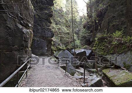 Stock Photography - Rock arch in Uttewalder Grund, hiking trail near Wehlen, Saxon Switzerland, Saxony, Germany, Europe. Fotosearch