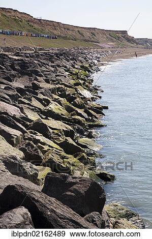 Rocks protecting the cliffs from erosion at Barton on Sea, Hampshire, England, United Kingdom, Europe View Large Photo Image Stock Photo - Rocks protecting the cliffs from erosion at Barton on Sea, Hampshire, England, United Kingdom, Europe. Fotosearch