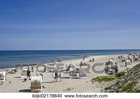 Roofed wicker beach chairs standing on the beach, Dahme, Baltic Sea, Schleswig-Holstein, Germany, Europe View Large Photo Image Stock Photo - Roofed wicker beach chairs standing on the beach, Dahme, Baltic Sea, Schleswig-Holstein, Germany, Europe. Fotosearch