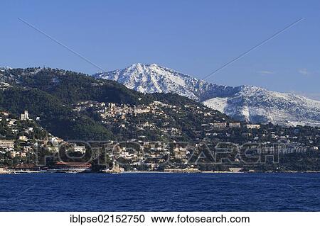 Roquebrune Cap Martin in winter, as seen from Port Hercule, Principality of Monaco, Côte d'Azur, Mediterranean Sea, Europe View Large Photo Image Stock Image - Roquebrune Cap Martin in winter, as seen from Port Hercule, Principality of Monaco, Côte d'Azur, Mediterranean Sea, Europe. Fotosearch