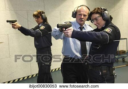 Routine weapons training at the Police HQ or headquarters shooting range, Mettmann, North Rhine-Westphalia, Germany, Europe View Large Photo Image Stock Image - Routine weapons training at the Police HQ or headquarters shooting range, Mettmann, North Rhine-Westphalia, Germany, Europe. Fotosearch