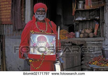 Sai Baba devotee, Kashi or Varanasi or Benares, Uttar Pradesh, North India, India, Asia View Large Photo Image Stock Photo - Sai Baba devotee, Kashi or Varanasi or Benares, Uttar Pradesh, North India, India, Asia. Fotosearch