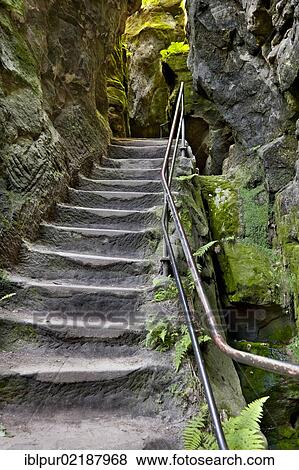 Stock Photo - Schwedenloecher hiking path, stairs leading to the bastion, Rathen, Saxon Switzerland, Saxony, Germany, Europe. Fotosearch
