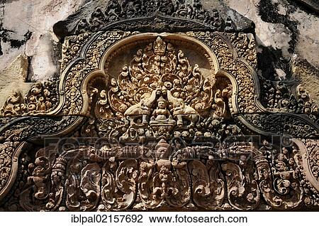 Stock Image - Sculptural relief, temple, Banteay Srei, Angkor, Siem Reap, Cambodia, Southeast Asia, Asia. Fotosearch