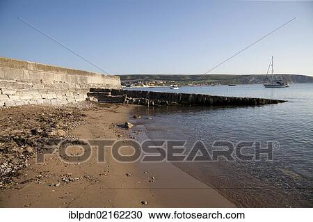 Sea wall sea defence and slipway at Swanage bay, Dorset, England, United Kingdom, Europe View Large Photo Image Stock Image - Sea wall sea defence and slipway at Swanage bay, Dorset, England, United Kingdom, Europe. Fotosearch