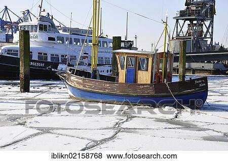 Stock Photo - Ships in the port of Hamburg in the winter, Hamburg, Germany, Europe. Fotosearch