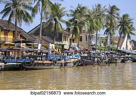 Stock Image - Ships, Thu Bon River, Hoi An, Vietnam, Southeast Asia, Asia. Fotosearch