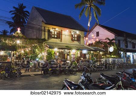 Shops and restaurants on the main street, Sisavangvong Road, at night, Luang Prabang, Laos, Indochina, Asia View Large Photo Image Stock Photography - Shops and restaurants on the main street, Sisavangvong Road, at night, Luang Prabang, Laos, Indochina, Asia. Fotosearch