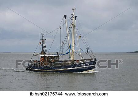 Shrimp boat "Nordstrand", NOR 232, on travelling in the Wadden Sea, UNESCO World Heritage Site, East Frisia, Lower Saxony, Germany, Europe View Large Photo Image Picture - Shrimp boat "Nordstrand", NOR 232, on travelling in the Wadden Sea, UNESCO World Heritage Site, East Frisia, Lower Saxony, Germany, Europe. Fotosearch