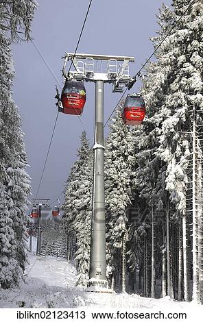 Skiing gondolas of a cable car, Wurmberg, Harz mountains, Lower Saxony, Germany, Europe View Large Photo Image Stock Image - Skiing gondolas of a cable car, Wurmberg, Harz mountains, Lower Saxony, Germany, Europe. Fotosearch