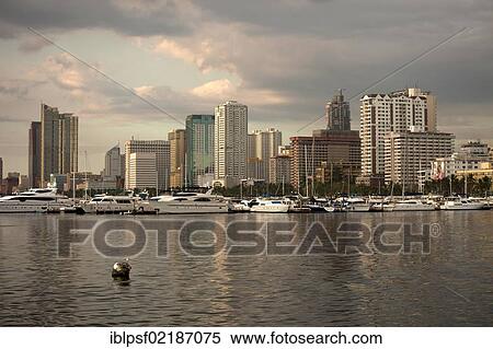 Stock Photography - Skyline and Yacht Club in Manila Bay, Manila, Philippines, Asia. Fotosearch