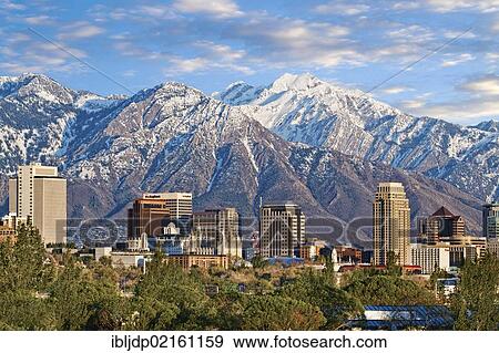 Skyline of downtown Salt Lake City with the towering Wasatch Mountain range at back, Utah, USA, North America View Large Photo Image Stock Photo - Skyline of downtown Salt Lake City with the towering Wasatch Mountain range at back, Utah, USA, North America. Fotosearch