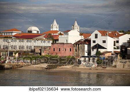 Picture - Small beach in front of the Old City, Casco Viejo, with the towers of the Cathedral, Panama City, Panama, Central America, North America. Fotosearch