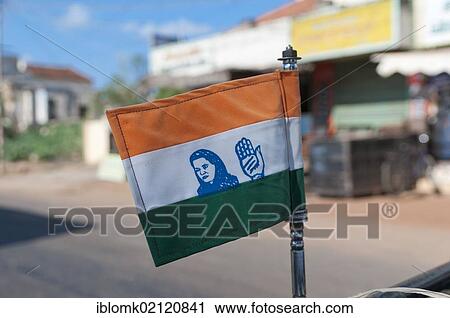 Small flag of the Indian Congress Party, with the symbol of a hand and the image of Sonia Gandhi, widow of Rajiv Gandhi, Karaikudi, Tamil Nadu, South India, India, Asia View Large Photo Image Stock Image - Small flag of the Indian Congress Party, with the symbol of a hand and the image of Sonia Gandhi, widow of Rajiv Gandhi, Karaikudi, Tamil Nadu, South India, India, Asia. Fotosearch