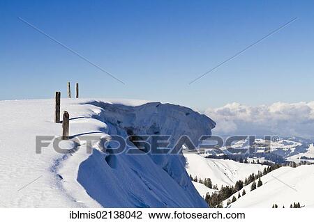 Stock Image - Snowdrift on Alp Spicher Mountain, Canton of St. Gallen, Switzerland, Europe. Fotosearch