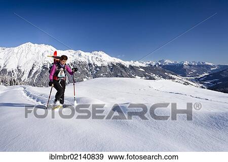 Snowshoeing in the ascent to the Jagelealm in the Ridnauntal valley above Entholz, Ridnauntalm in the baack, Mt. Rosskopf and the Telfer Weissen, South Tyrol, Italy, Europe View Large Photo Image Stock Photo - Snowshoeing in the ascent to the Jagelealm in the Ridnauntal valley above Entholz, Ridnauntalm in the baack, Mt. Rosskopf and the Telfer Weissen, South Tyrol, Italy, Europe. Fotosearch