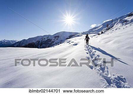Snowshoer ascending to Jagelealm alpine pasture in Ridnaun Valley above Entholz, Alto Adige, Italy, Europe View Large Photo Image Stock Image - Snowshoer ascending to Jagelealm alpine pasture in Ridnaun Valley above Entholz, Alto Adige, Italy, Europe. Fotosearch