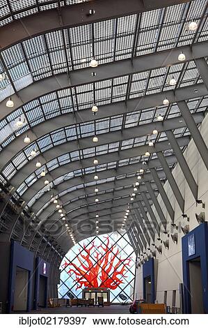Solar roof in Messe Essen Exhibition Centre, roof of the connecting corridor between the exhibition halls in the west-wing covered with solar panels, glass art work by art professor Joerg Immendorff, Essen, North Rhine-Westphalia, Germany, Europe View Large Photo Image Stock Photo - Solar roof in Messe Essen Exhibition Centre, roof of the connecting corridor between the exhibition halls in the west-wing covered with solar panels, glass art work by art professor Joerg Immendorff, Essen, North Rhine-Westphalia, Germany, Europe. Fotosearch