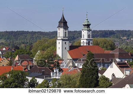 Stock Photo - Spires of the churches Muenster Unserer Lieben Frau and St. Stephan, Lindau on Lake Constance, Swabia, Bavaria, Germany, Europe. Fotosearch